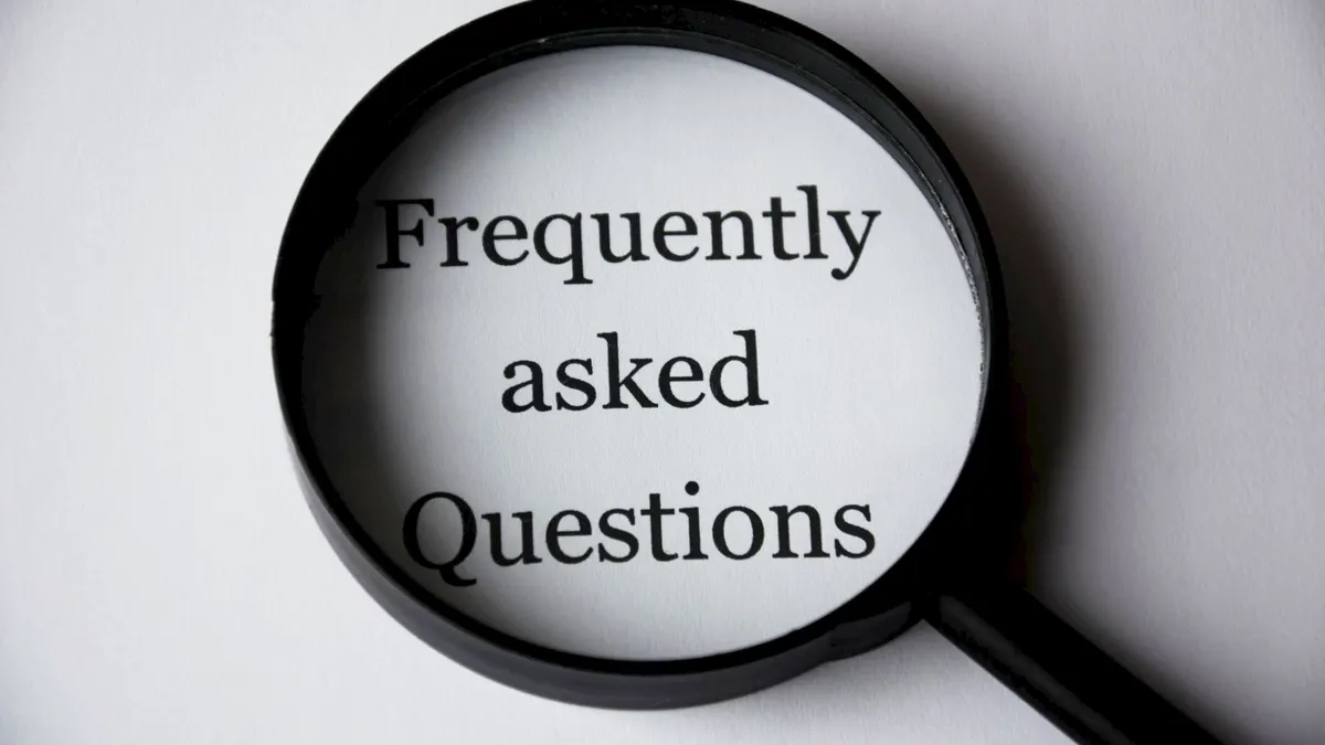 magnifying glass over Frequently asked Questions
