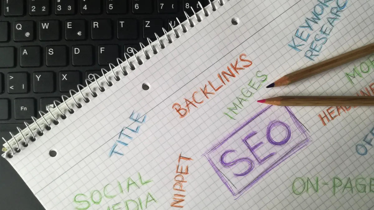 Notebook with SEO, backlinks, and keyword research notes